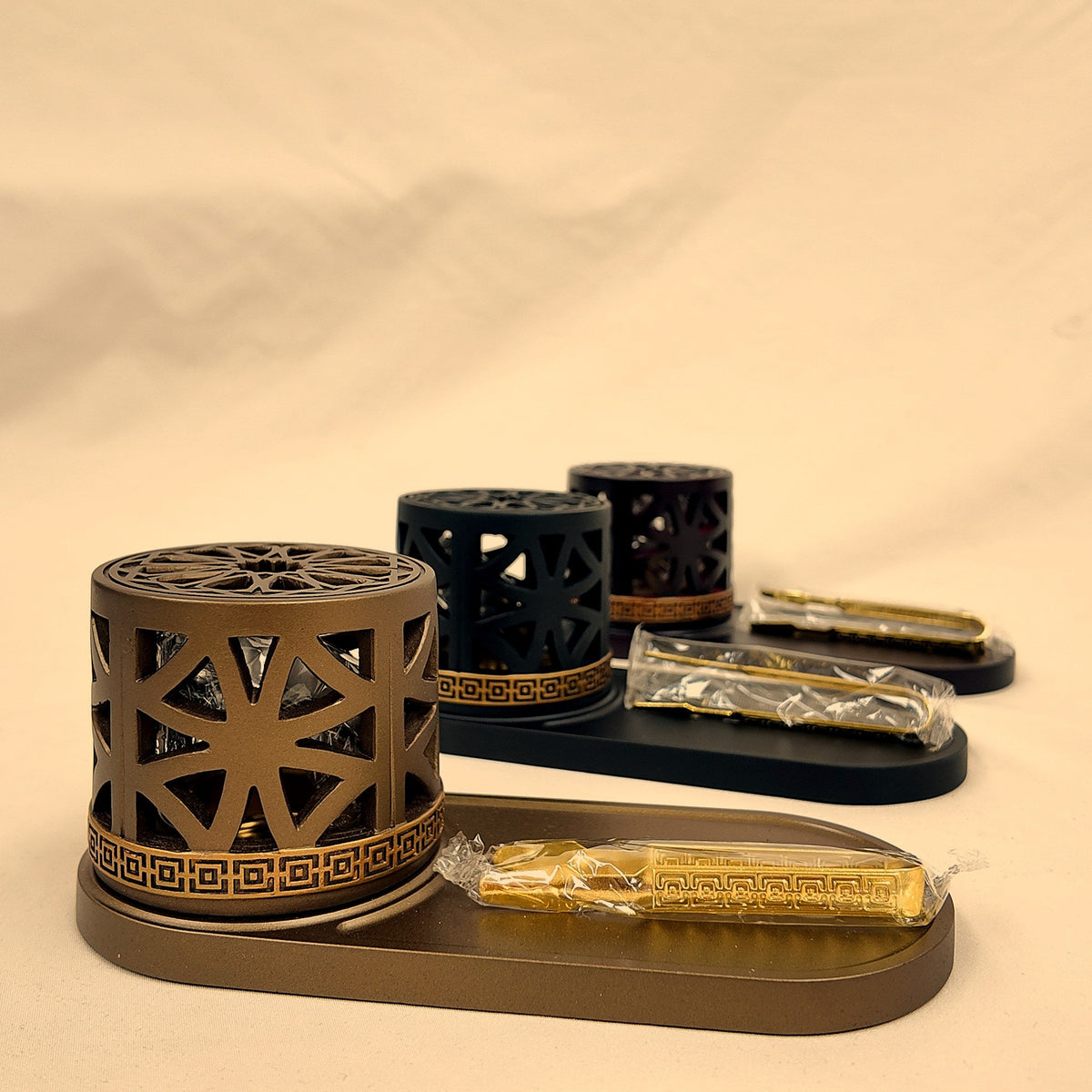 Mashrabiya Tray Style Burner set in all three colors, Champagne in front [Champagne]