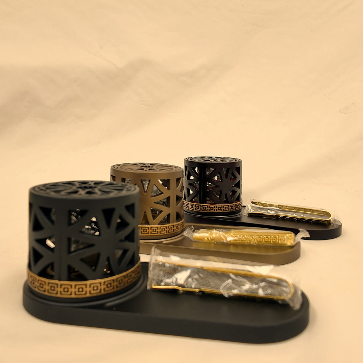 Mashrabiya Tray Style Burner set in all three colors, Black in front [Black]