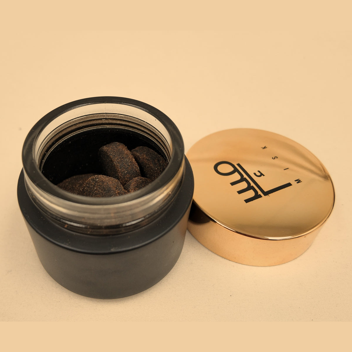 Tafas handmade bakhoor — open jar with the gold Misk lid